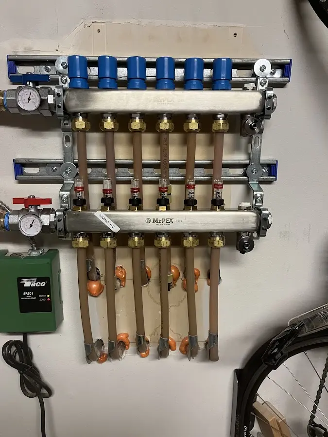 Plumber performing Gas Line Installation at a residential property in Dennis